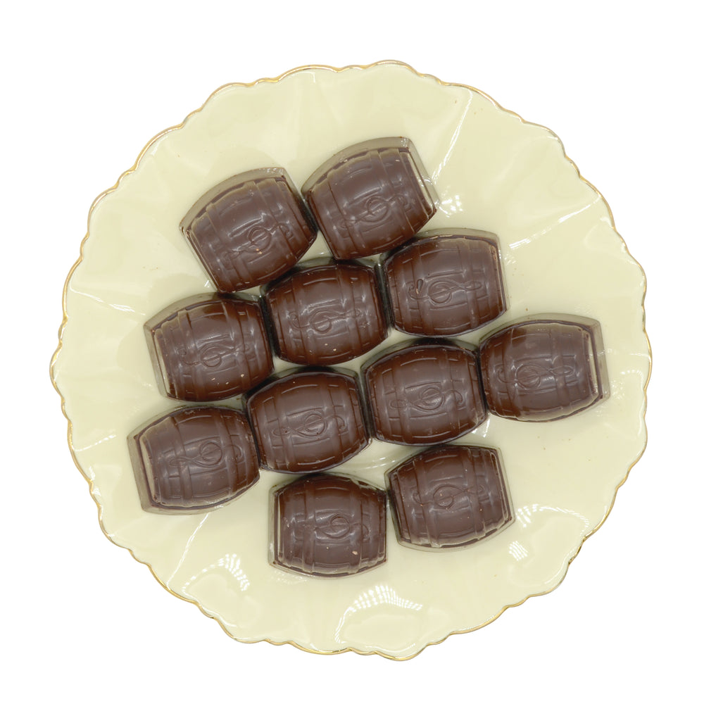Šokoladiniai saldainiai su karčiojo šokolado įdaru, pagardintu midumi.